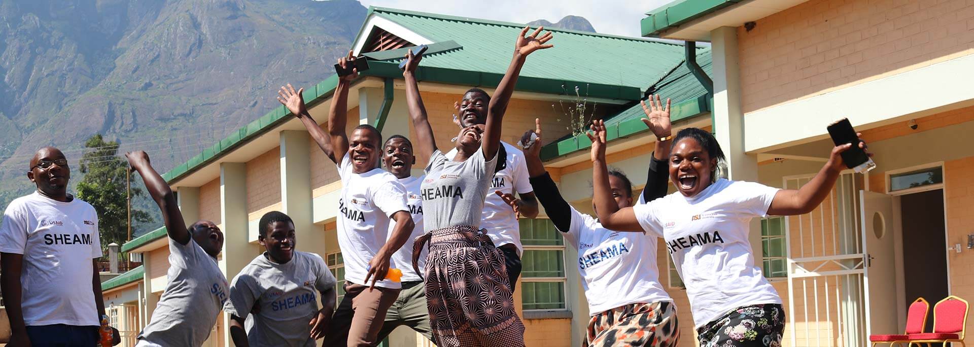 
		Students jumping for joy		